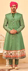 Exclusively for couple combo Green designer outfit in pure pv silk and foil print with detailed hand mirror work