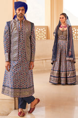 Exclusive latest Blue designer Gown in pure pv silk and foil print with net dupatta detailed embroidery, hand and mirror work