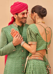Exclusively for couple combo Green designer outfit in pure pv silk and foil print with detailed hand mirror work