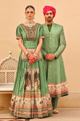 Exclusively for couple combo Green designer outfit in pure pv silk and foil print with detailed hand mirror work