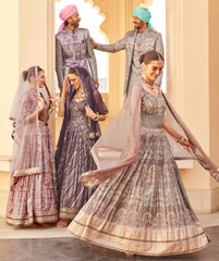 Exclusive latest Purple designer Gown in pure pv silk and foil print with net duppatta detailed embroidery, hand and mirror work