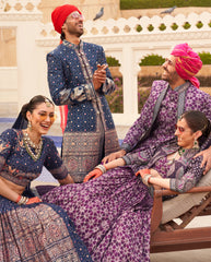 Exclusive latest Purple designer Lehenga in pure pv silk and foil print with detailed embroidery, hand and mirror work