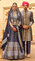Exclusive latest Loyal Blue designer Lehenga in pure pv silk and foil print with detailed embroidery, hand and mirror work