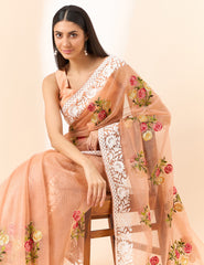Latest light Orange shaded organza saree with detailed embroidery and floral inspired design saree for all occasion