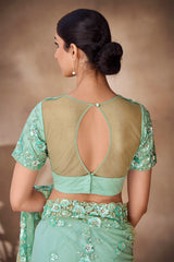 Beautiful Exclusive pastel shaded net saree with detailed work of sequins, thread and zarkan