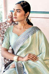 Pure Kanjivaram pastel green light shaded weaving silk handloom saree with contrasting dark border