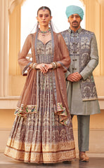 Exclusive latest designer Gown in pure pv silk and foil print with net duppatta detailed embroidery, hand and mirror work