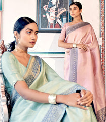 Pure Kanjivaram pastel pink light shaded weaving silk handloom saree with contrasting dark border