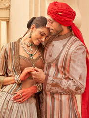 Exclusively for couple combo Light brown designer outfit in pure pv silk and foil print with detailed hand mirrorwork