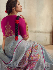 Exquisite Contrasting Light Blue Floral Organza saree with beautiful print, piping work or tassels on pallu | party wear saree | Festive saree