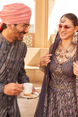 Exclusive latest Purple designer Gown in pure pv silk and foil print with net duppatta detailed embroidery, hand and mirror work