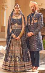 Exclusive latest Royal Blue designer Gown in pure pv silk and foil print with net dupatta detailed embroidery, hand and mirror work