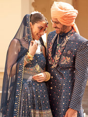 Exclusive latest Royal Blue designer Gown in pure pv silk and foil print with net dupatta detailed embroidery, hand and mirror work