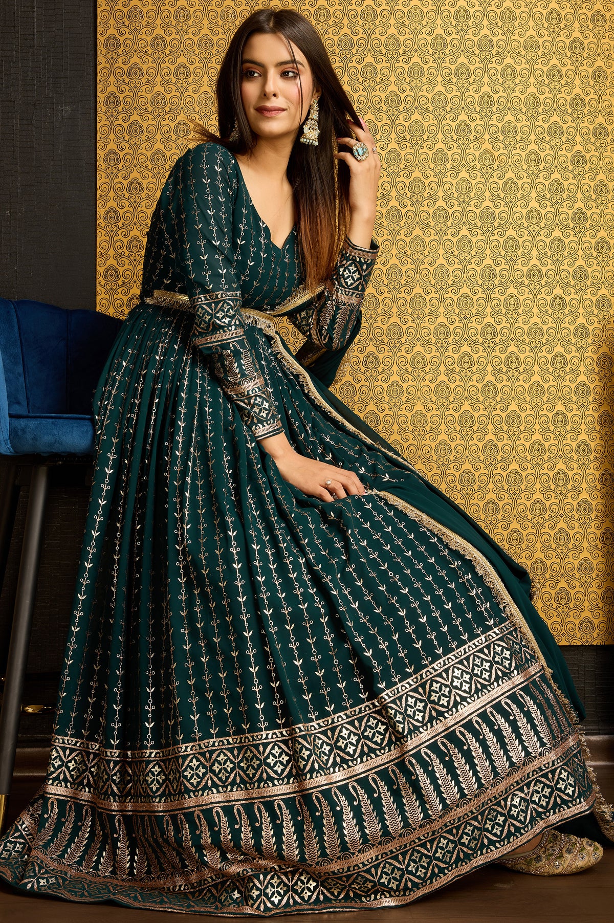 Exclusive Designer Green Gown on georgette with detailed metallic foil work and handwork on neck