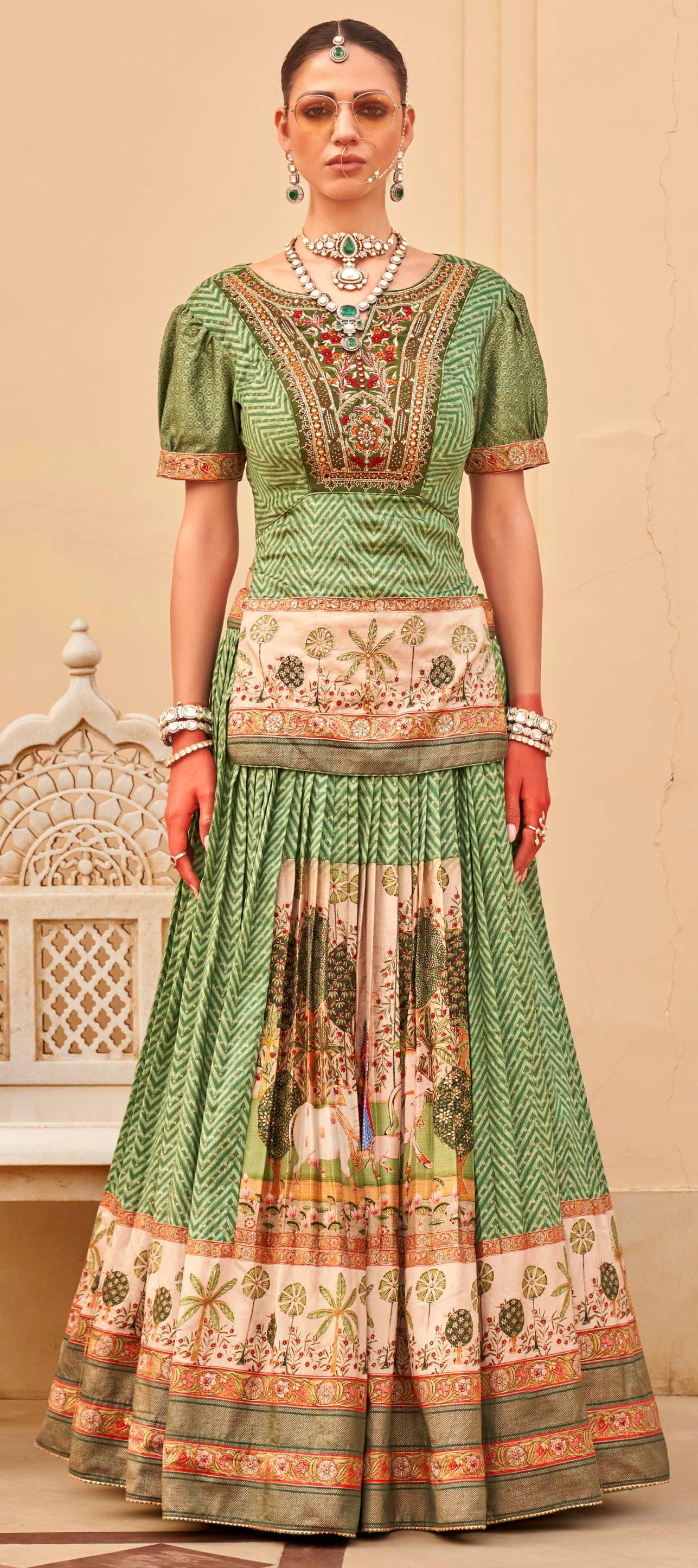 Exclusively for couple combo Green designer outfit in pure pv silk and foil print with detailed hand mirror work