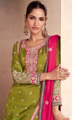 Designer green contrasting pure silk dress with deatiled embroidery work