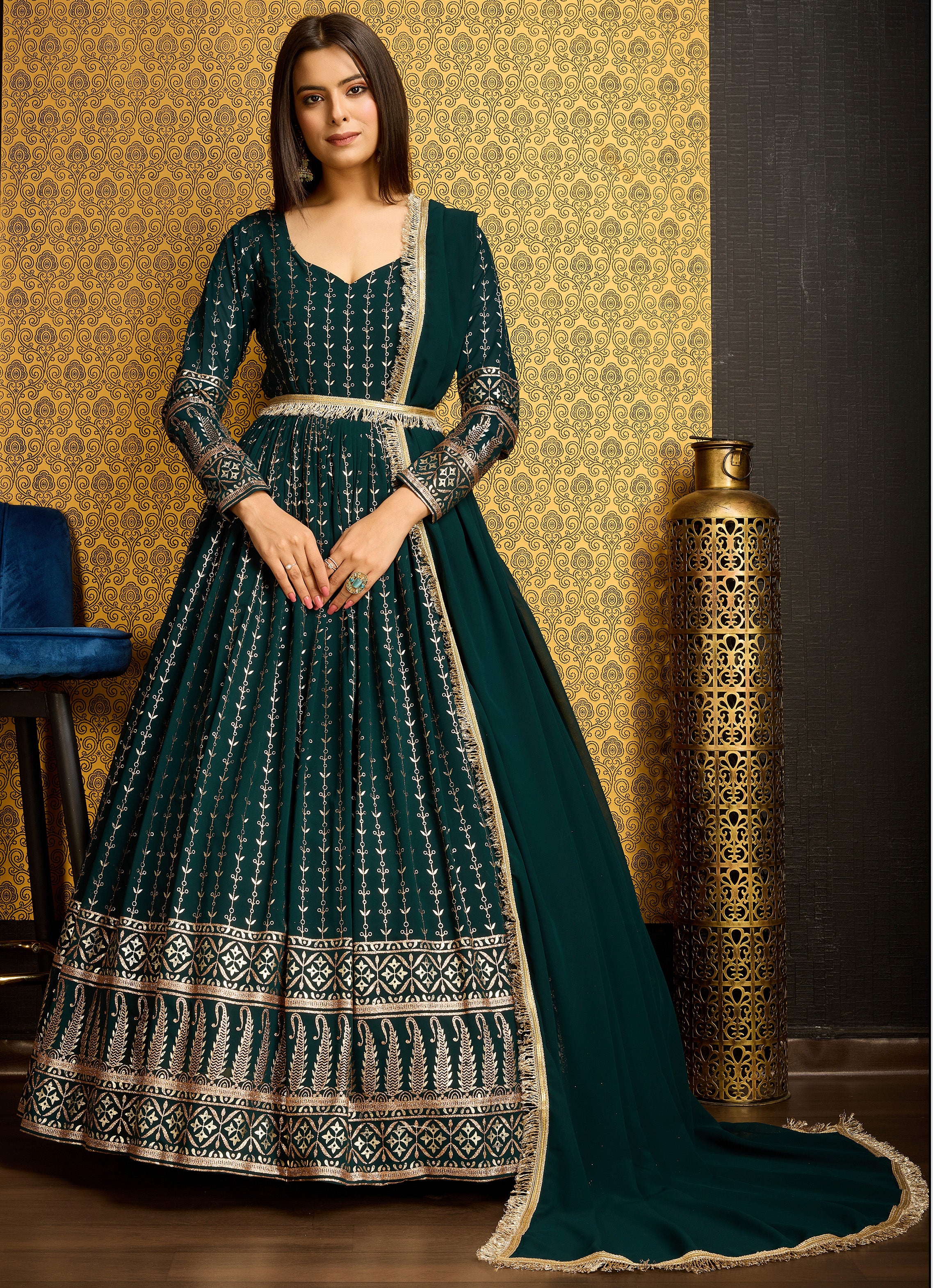 Exclusive Designer Green Gown on georgette with detailed metallic foil work and handwork on neck