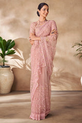 Beautiful Exclusive pastel shaded net saree with detailed work of sequins, thread and zarkan