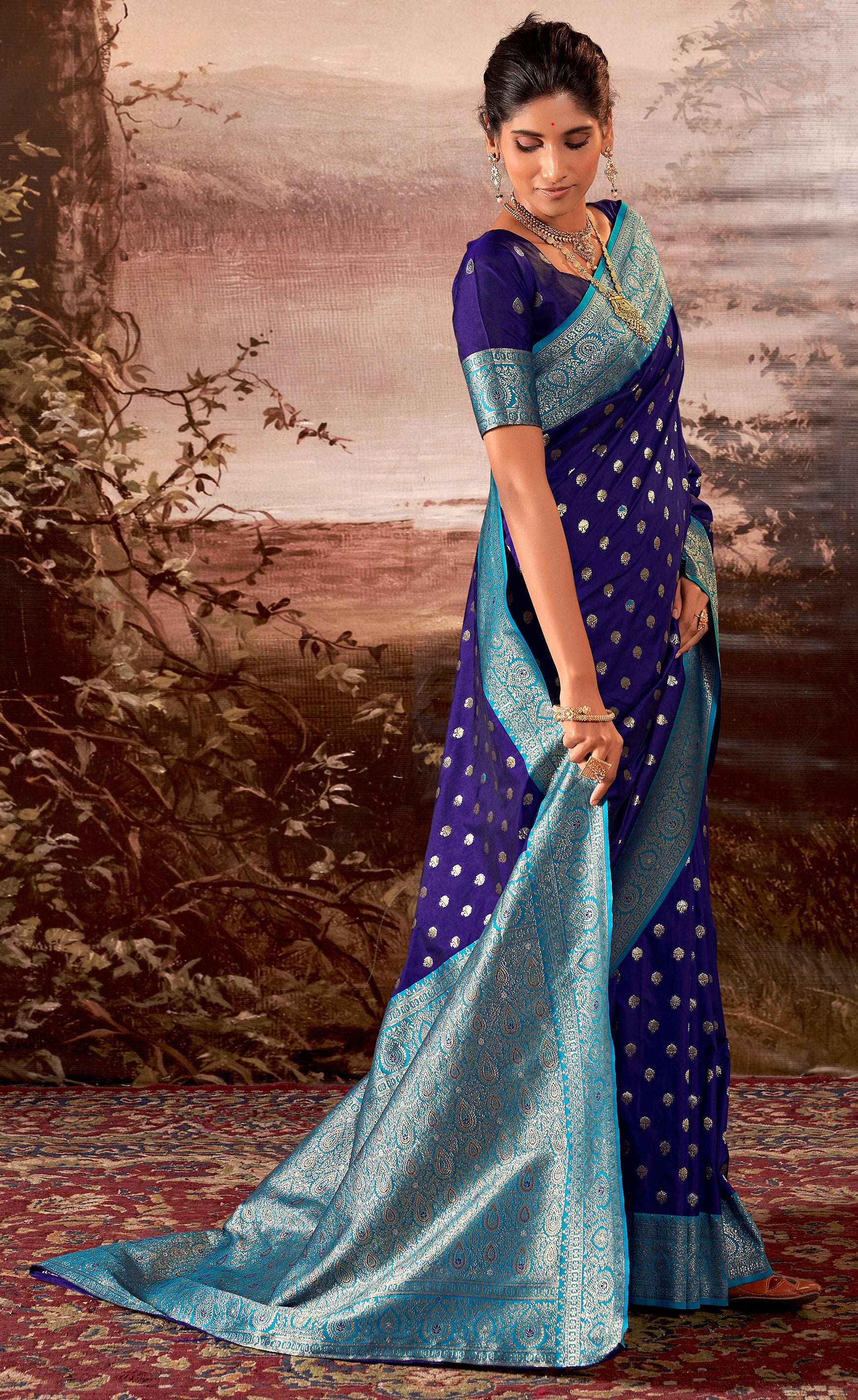 Contrasting dark shaded Blue Banarasi soft silk saree with detailed banarasi inspired work