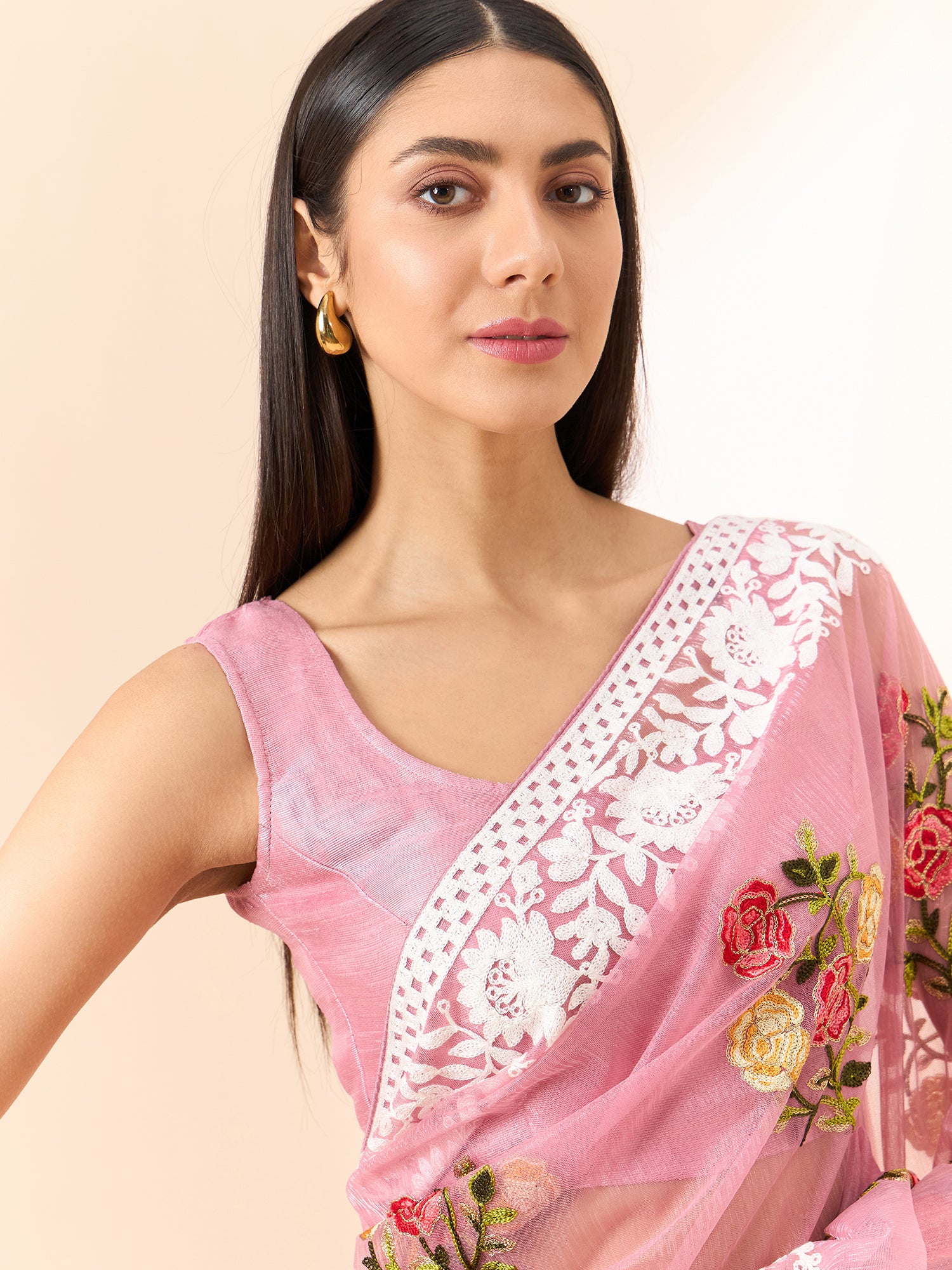 Latest light pink shaded organza saree with detailed embroidery and floral inspired design saree for all occassion