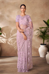 Beautiful Exclusive pastel shaded net saree with detailed work of sequins, thread and zarkan