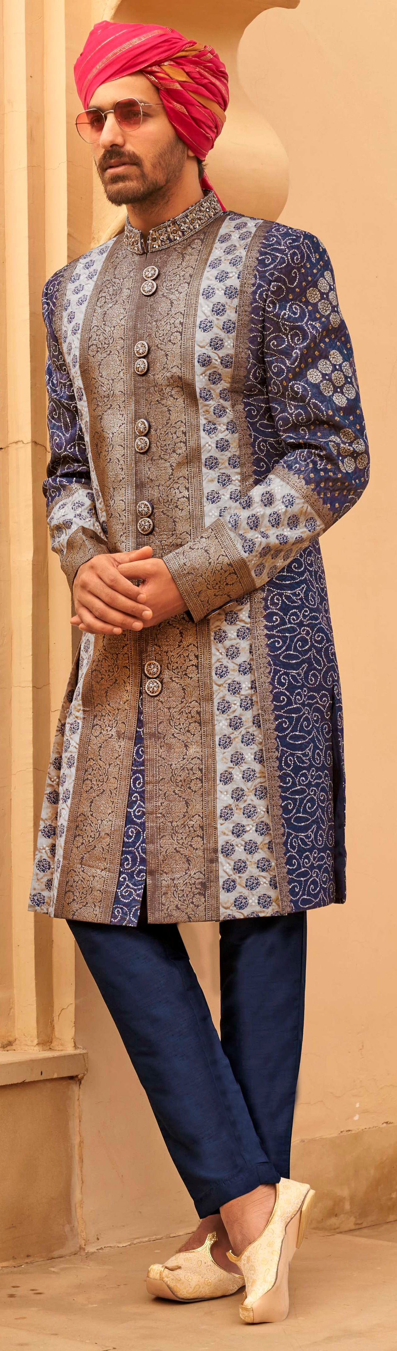 Exclusively for couple combo Blue designer outfit in pure pv silk and foil print with detailed hand mirror work