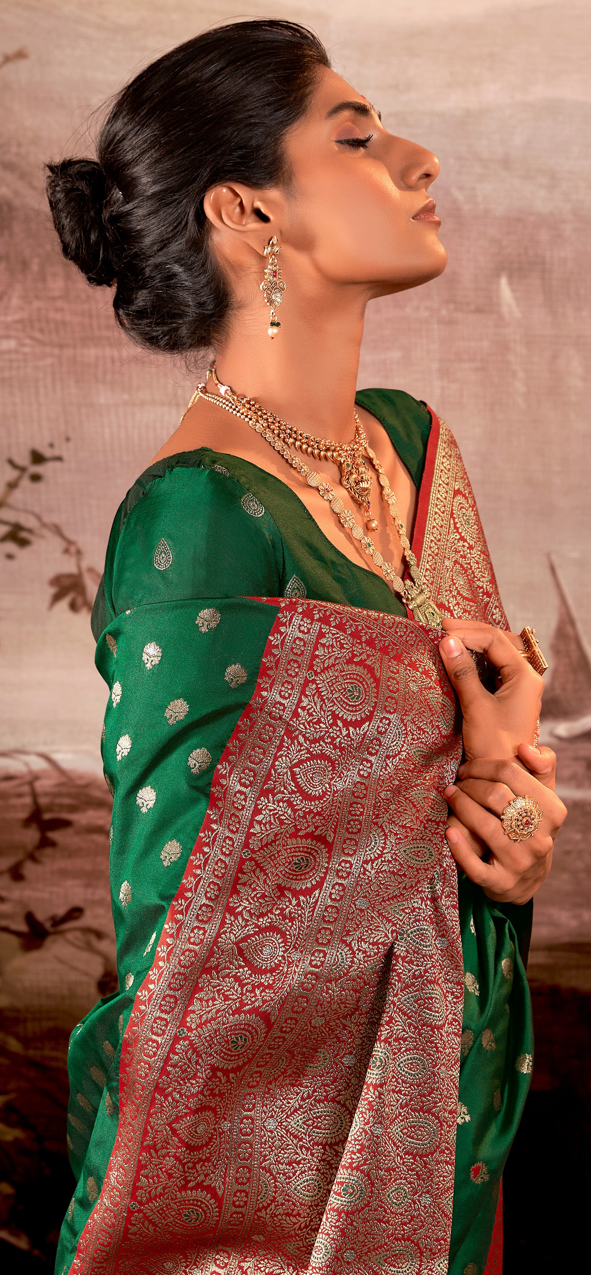 Contrasting dark shaded Green Banarasi soft silk saree with detailed banarasi inspired work