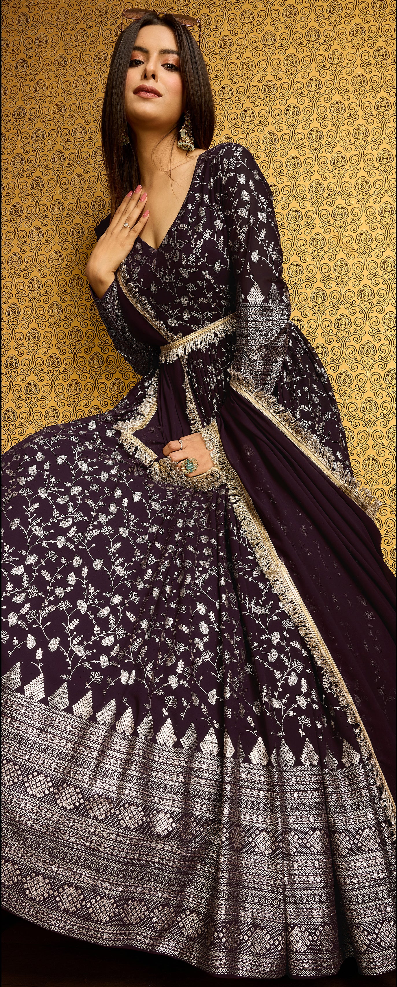 Exclusive Designer Wine Gown on georgette with detailed metallic foil work and handwork on neck