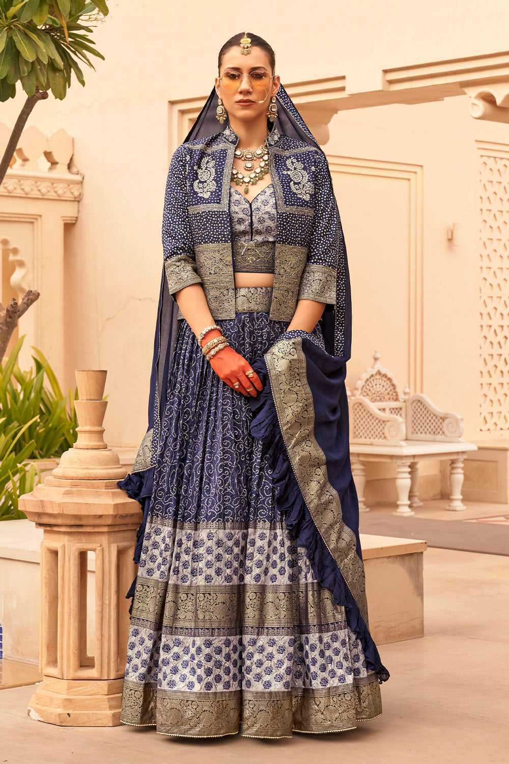 Exclusive latest Loyal Blue designer Lehenga in pure pv silk and foil print with detailed embroidery, hand and mirror work