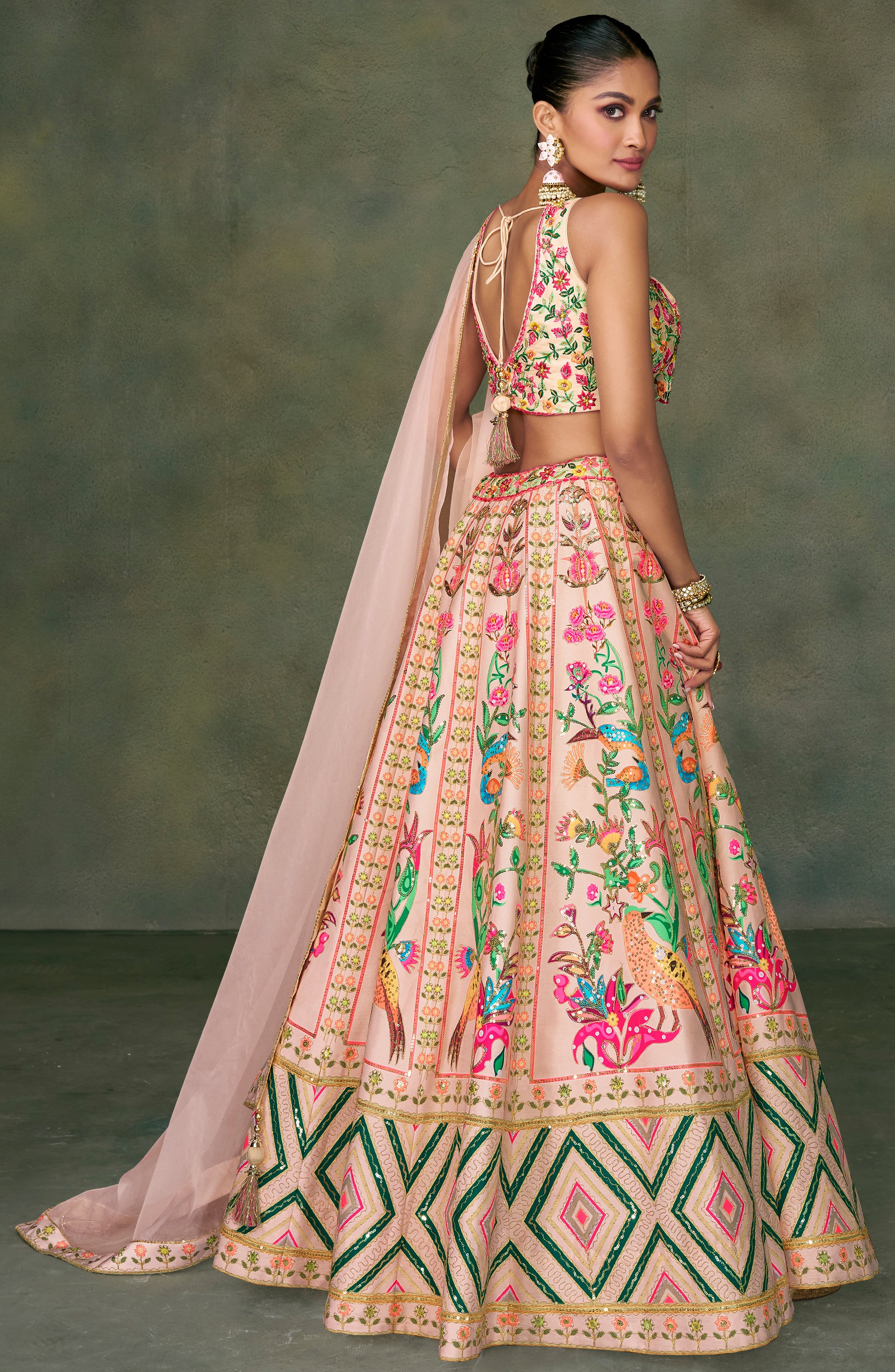 Contrasting silk designer lehenga with detailed embroidery work dupata in net