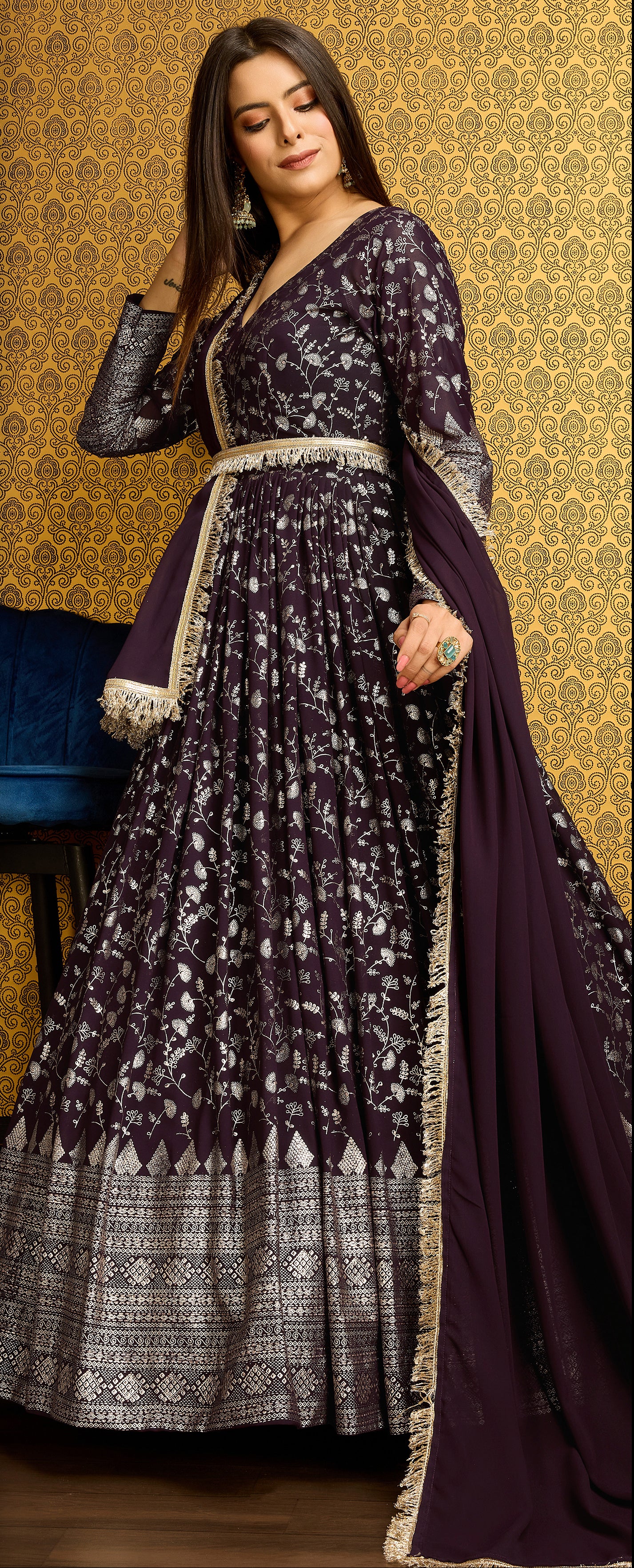 Exclusive Designer Wine Gown on georgette with detailed metallic foil work and handwork on neck