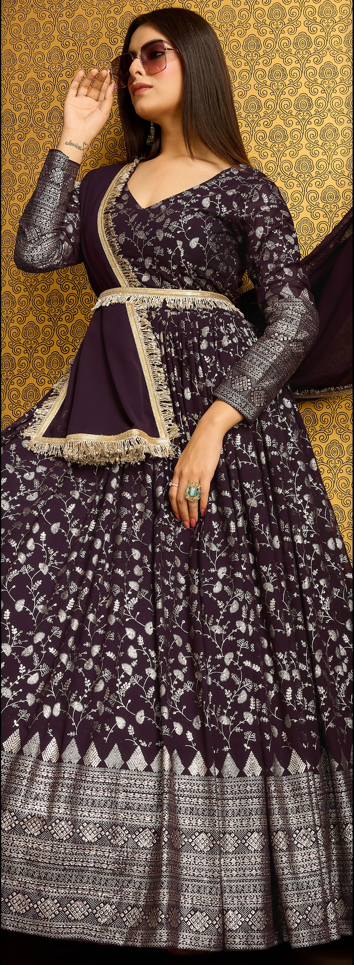 Exclusive Designer Wine Gown on georgette with detailed metallic foil work and handwork on neck