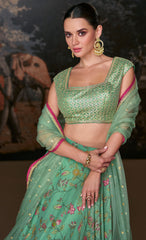 Designer lehenga on banglori silk blouse and pure organza silk with detailed embroidery