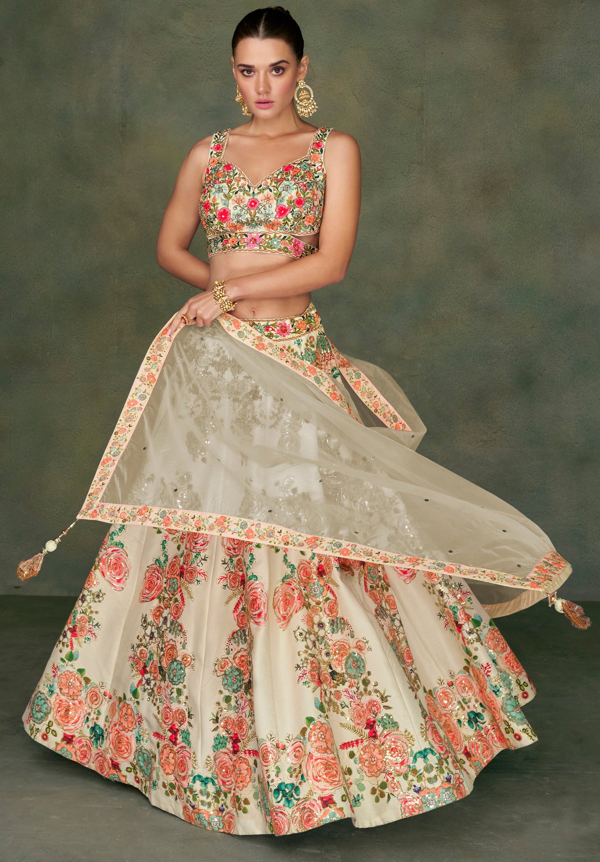 Contrasting silk designer lehenga with detailed embroidery work dupata in net