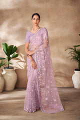 Beautiful Exclusive pastel shaded net saree with detailed work of sequins, thread and zarkan