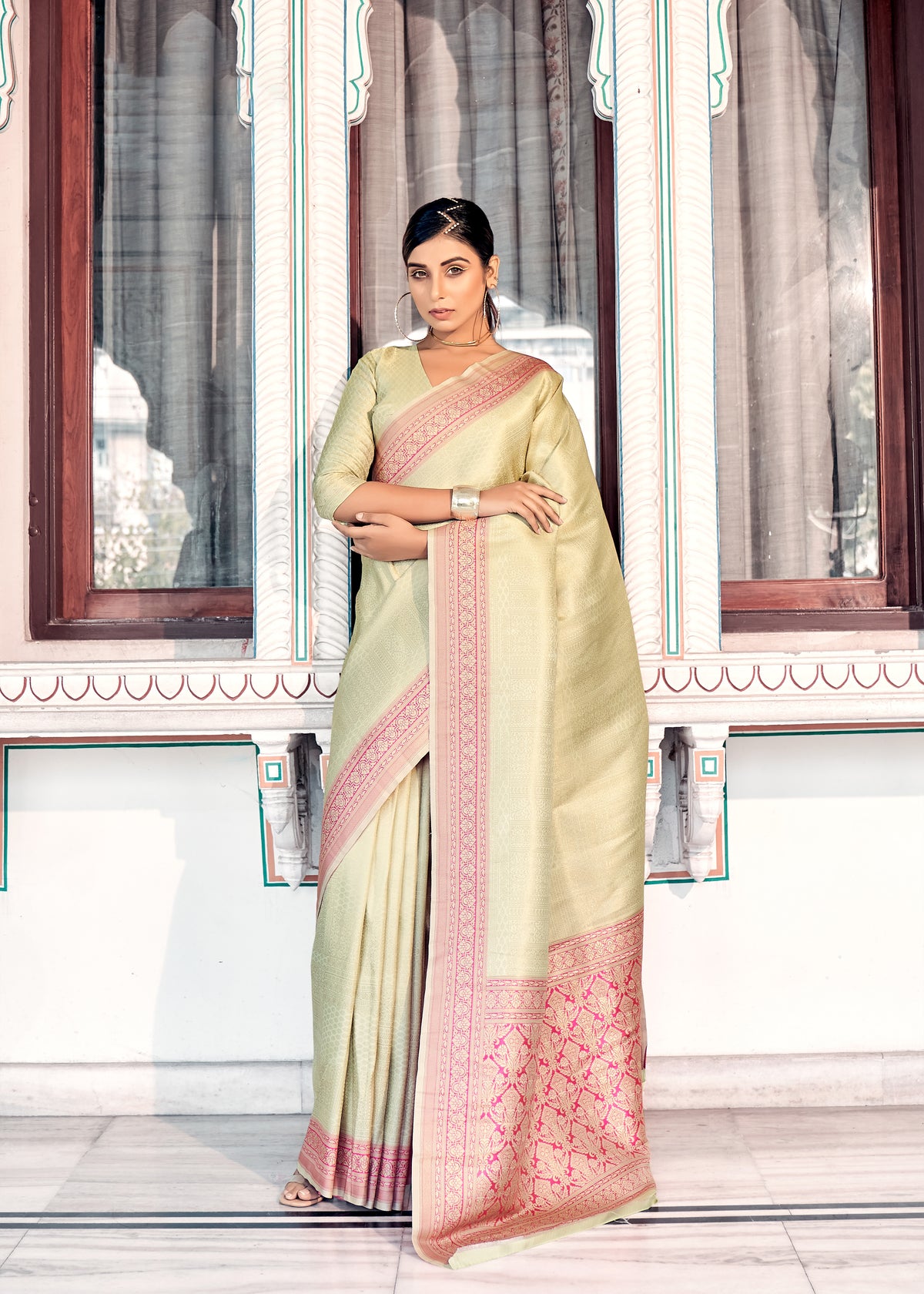 Pure Kanjivaram pastel green light shaded weaving silk handloom saree with contrasting dark border