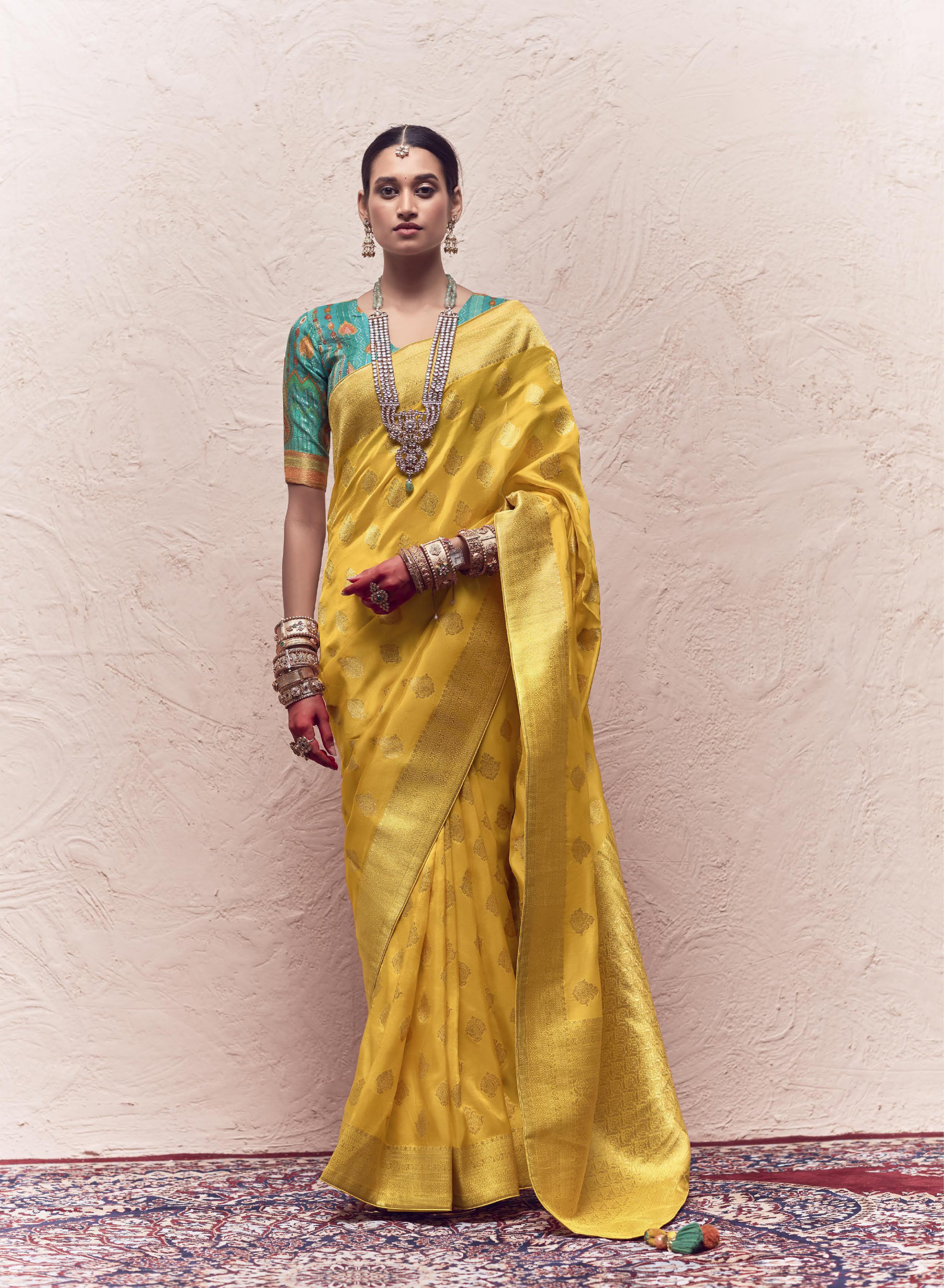 Contrasting Fancy Blouse Saree on Pure Crape Dola Silk Saree with Tussles on Pallu