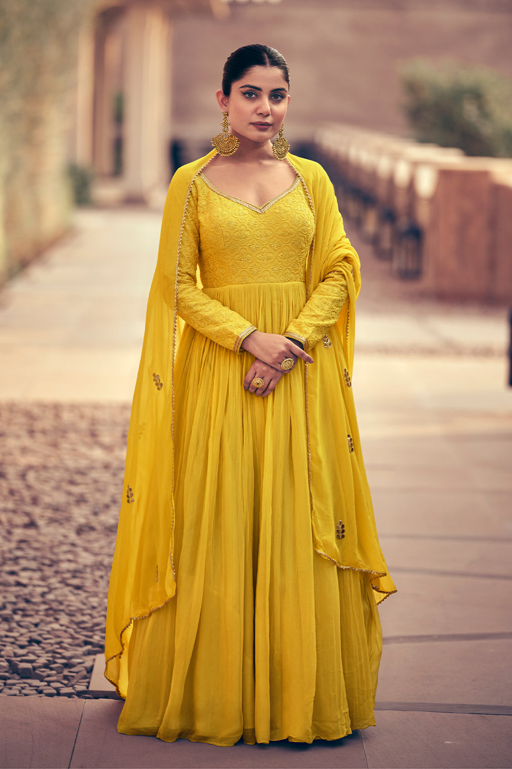 Pure Georgette yellow exclusive dress with detailed Embroidered dress