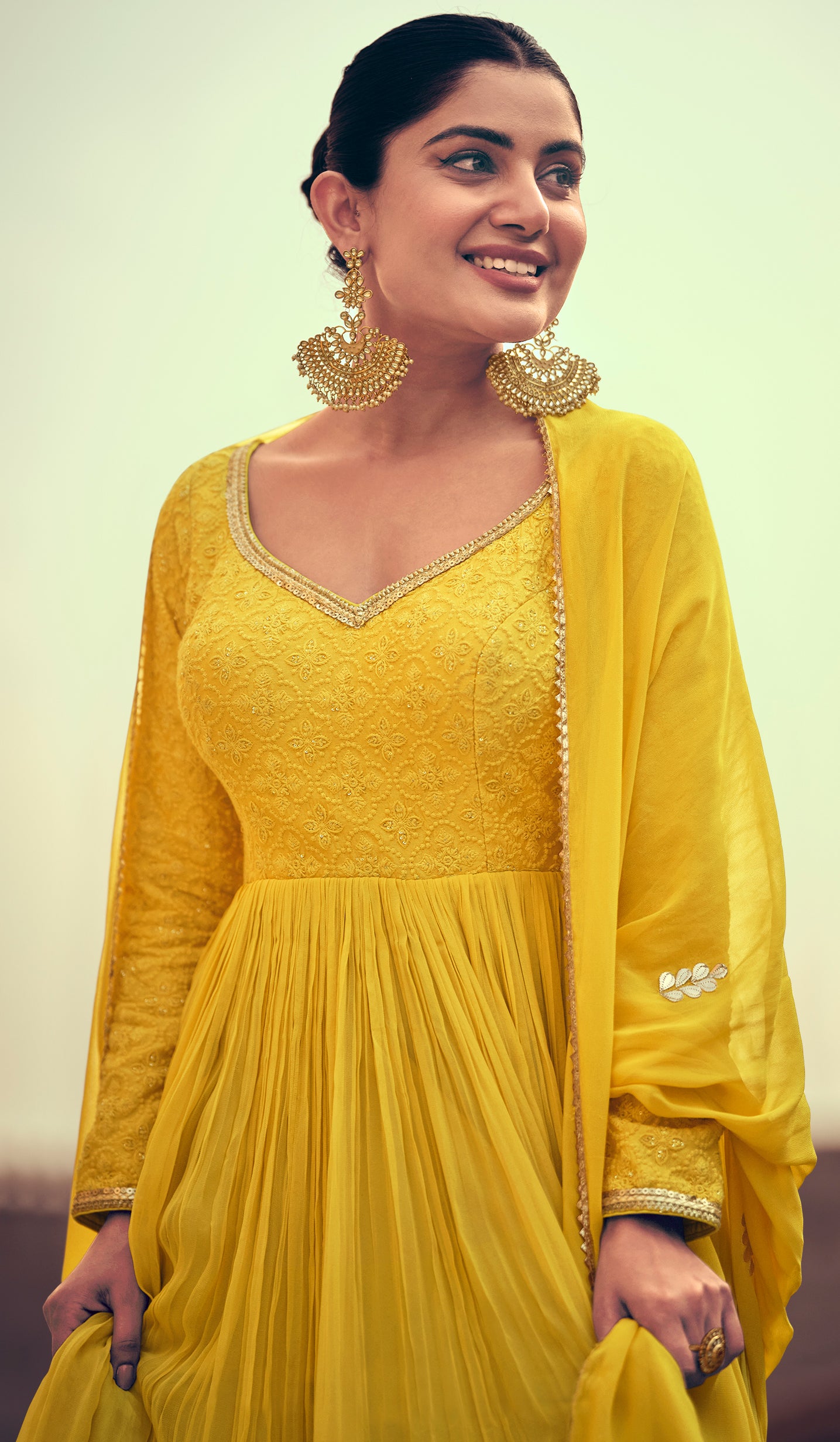 Pure Georgette yellow exclusive dress with detailed Embroidered dress