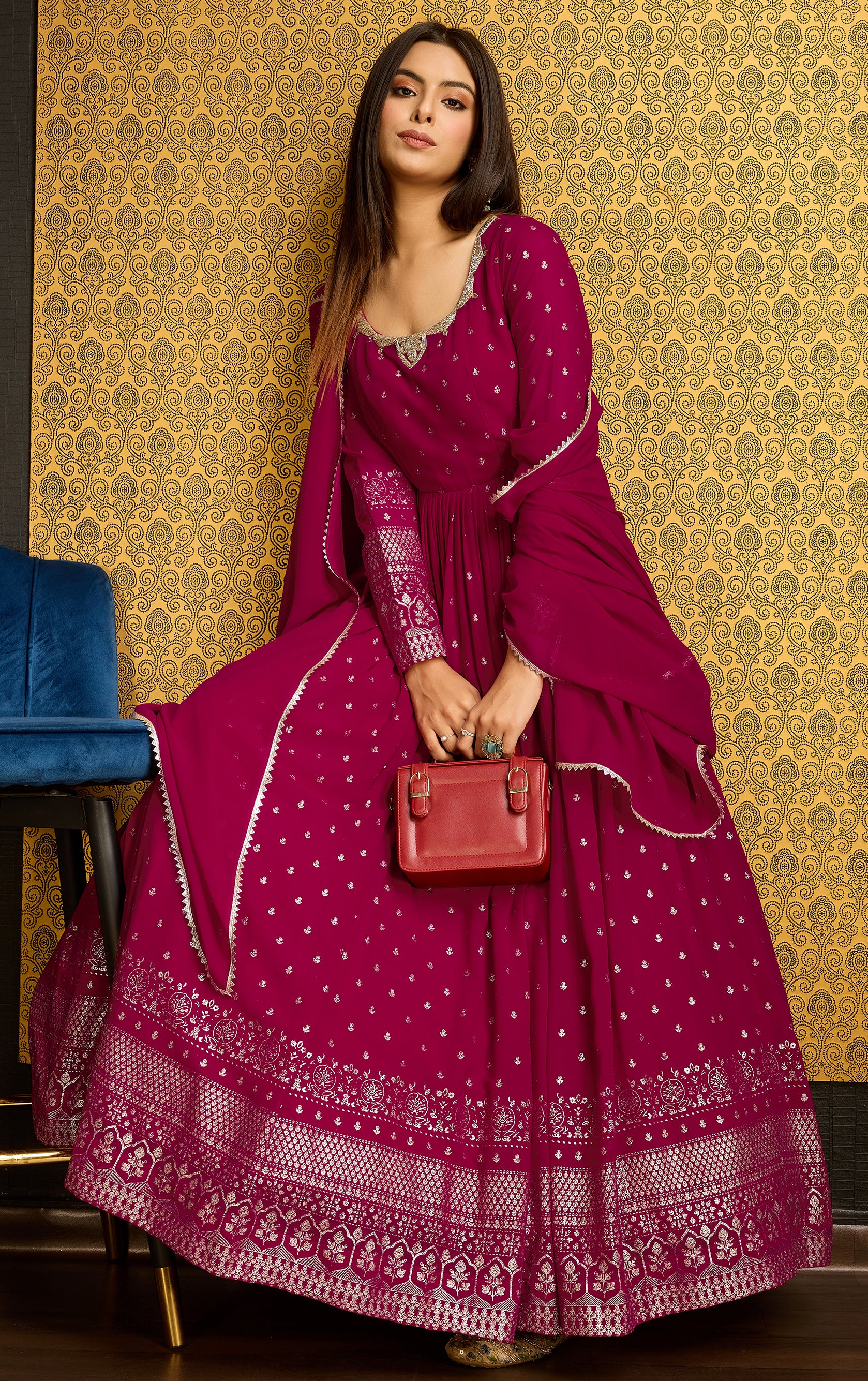 Exclusive Designer Pink Gown on georgette with detailed metallic foil work and handwork on neck