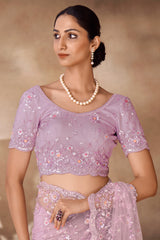 Beautiful Exclusive pastel shaded net saree with detailed work of sequins, thread and zarkan