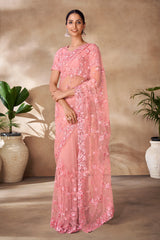 Beautiful Exclusive pastel shaded net saree with detailed work of sequins, thread and zarkan