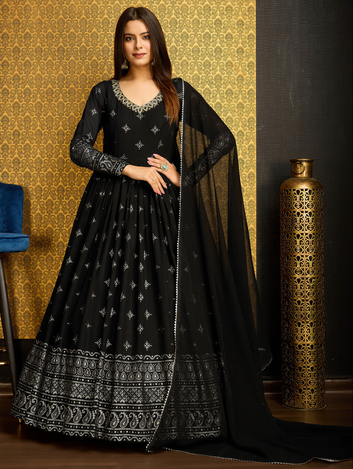 Exclusive Designer Black Gown on georgette with detailed metallic foil work and handwork on neck