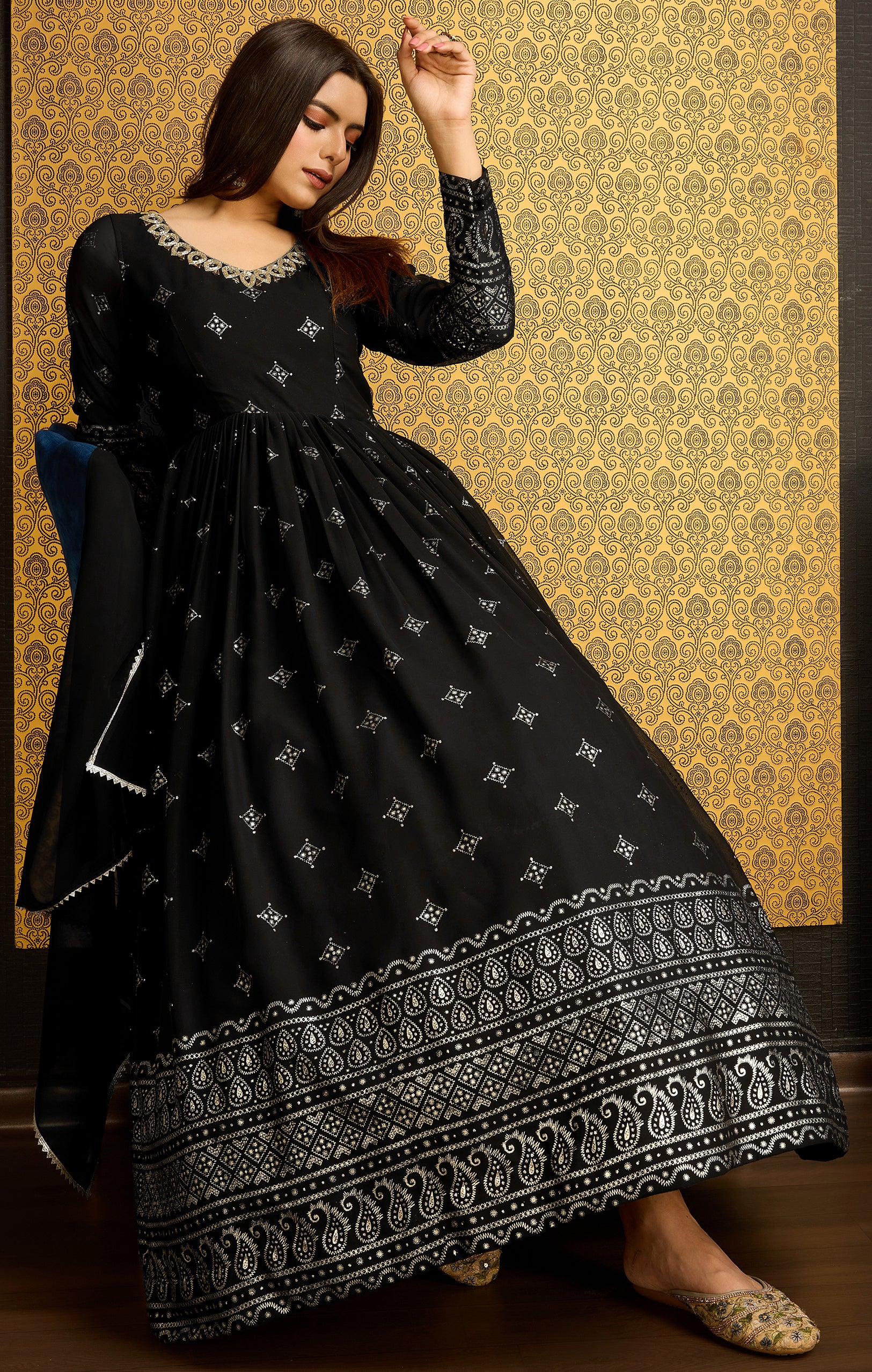 Exclusive Designer Black Gown on georgette with detailed metallic foil work and handwork on neck