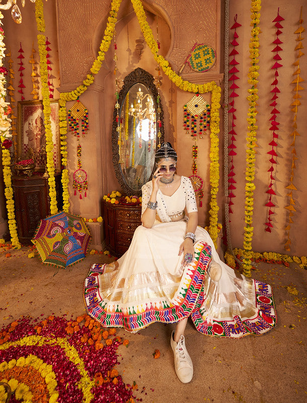 Beautiful white Lehenga with mirror work blouse