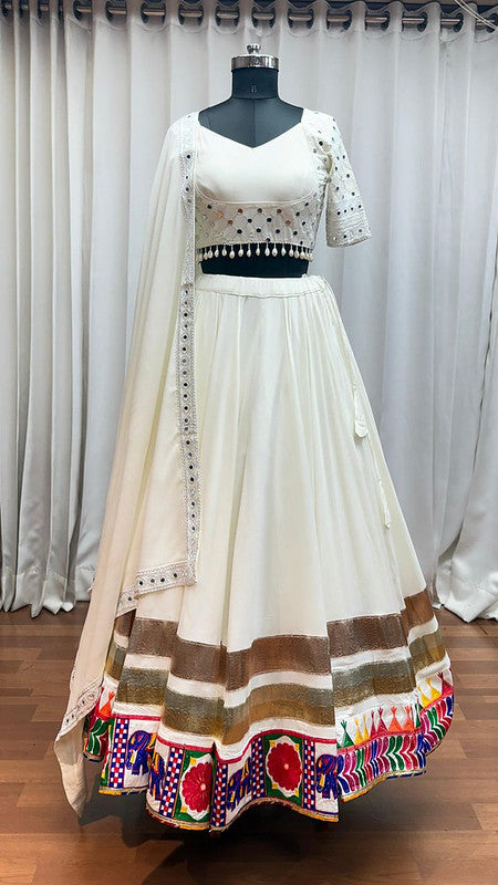 Beautiful white Lehenga with mirror work blouse