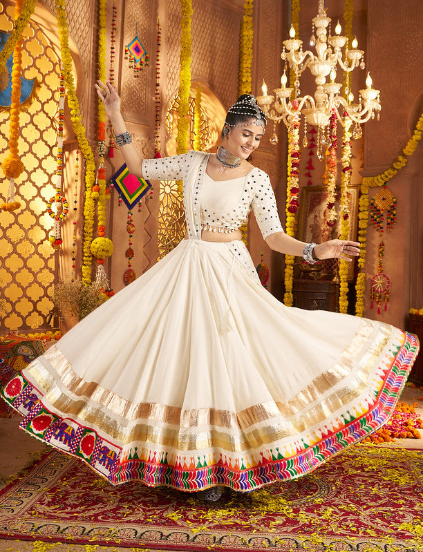 Beautiful white Lehenga with mirror work blouse