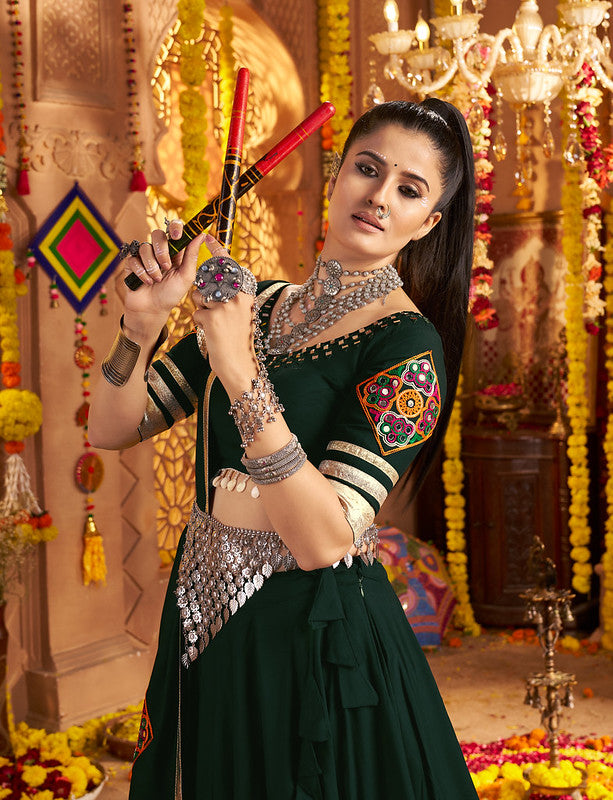 Dark green Lehenga with elegance of tassels and khatli work