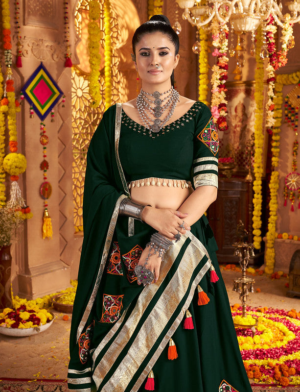 Dark green Lehenga with elegance of tassels and khatli work