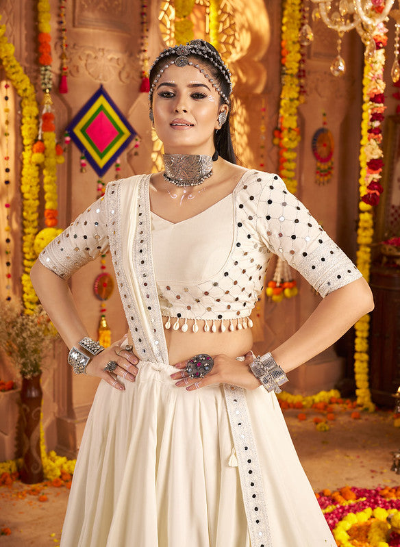Beautiful white Lehenga with mirror work blouse